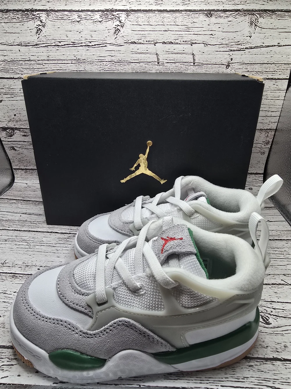 Jordan 4 RM Kids' White and Gray Athletic Sneakers with Green Accents